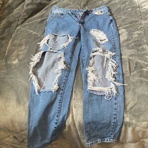 Size S, ripped blue jeans, loose fit